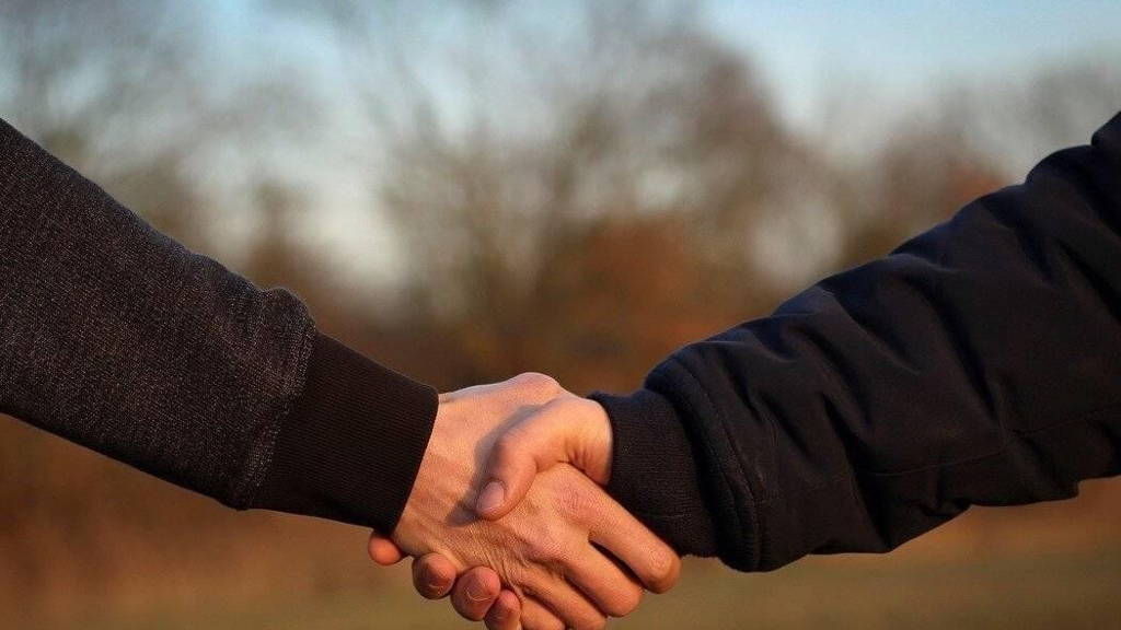 Samenwerken-Handshake
