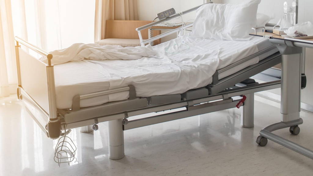 Soft focus background of electrical adjustable patient bed in ho